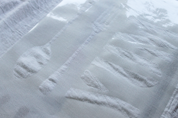 adding stencil to DIY tea towels 