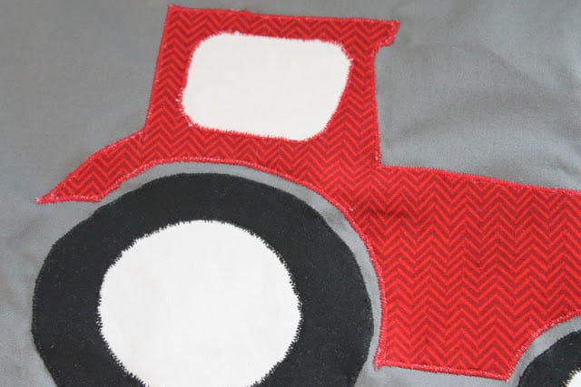 Tractor Applique Pillow -- see how to make this great pillow for your little guy! Tractor Applique Pillow -- see how to make this great pillow for your little guy!