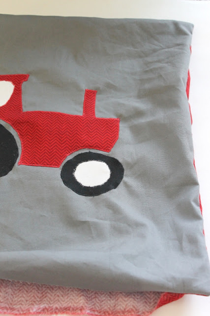 Tractor Applique Pillow -- see how to make this great pillow for your little guy!