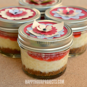 Half Pint Cherry Cheesecakes in Flower-Topped Mason Jars by Happy Hour Projects