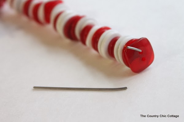 assembling white and red candy cane ornament