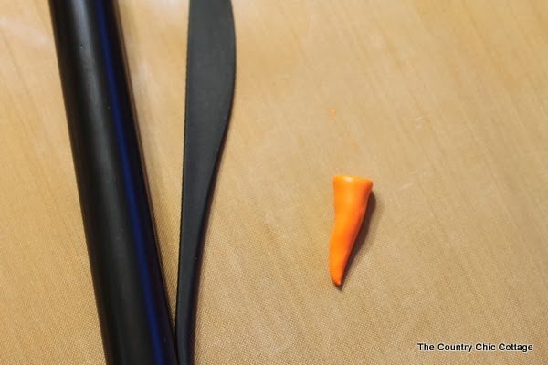 create carrot nose from Sculpey clay