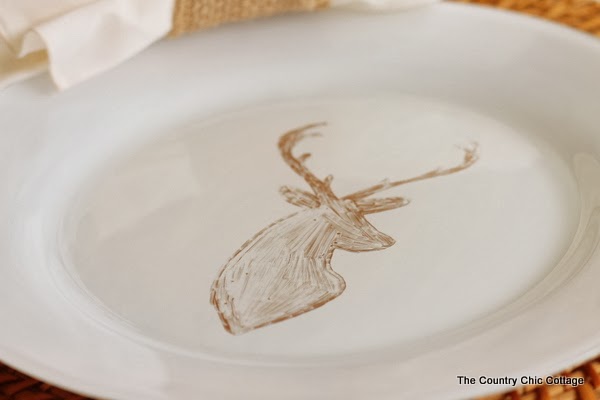 DIY Deer Painted Plates -- a quick 10 minute way to make gorgeous custom designed plates with a sharpie and paint!