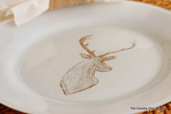 DIY Deer Painted Plates -- a quick 10 minute way to make gorgeous custom designed plates with a sharpie and paint! DIY Deer Painted Plates