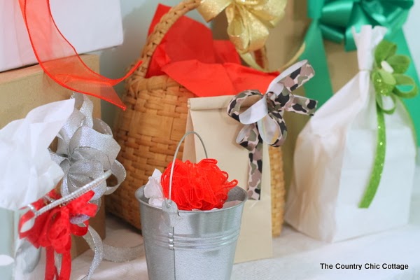 DIY Handmade Bows with the Bowdabra -- a quick and easy way to make bows for your holiday packages. DIY Handmade Bows for wrapped gifts