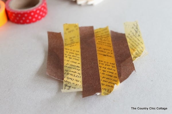 Washi Tape Fall Leaf Garland -- a fun craft project that you can make in minutes for your Thanksgiving or fall decor.