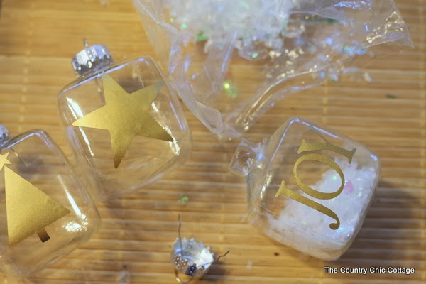 Gold Silhouette Ornaments -- make these simple Christmas ornaments using gold vinyl in just a few minutes.