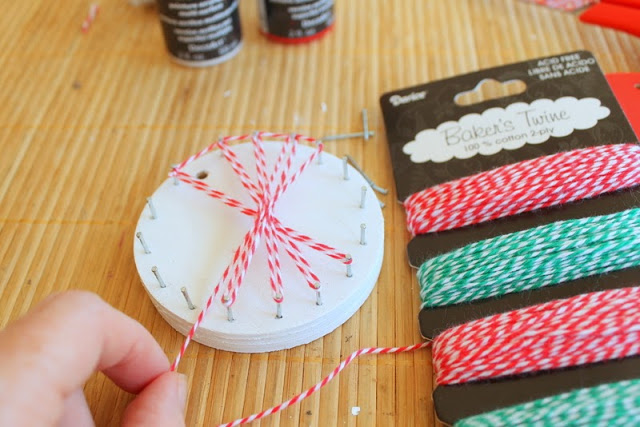 String Art Ornaments -- a fun and unique craft project to make with your kids this Christmas -- grab some wood and string to get started. wrapping twine to make Christmas String Art Ornaments