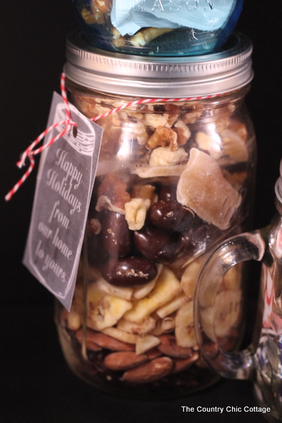 10 Gifts in a Jar -- get 10 ideas for gifts in jars in a fun 10 minute video. Great quick and easy gift ideas in this post! Dried Fruit And Nuts Mason Jar Idea