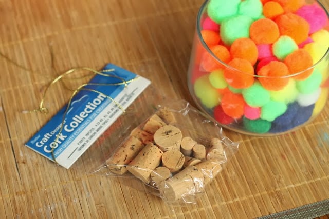 Kids Craft: Cork Tree Ornaments -- make these in just a few minutes with the kids help of course! cork and pompom supplies for this craft