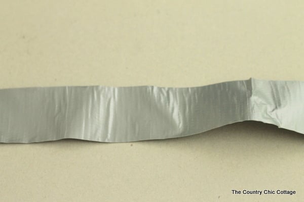 Gift wrap for men with duct tape -- a fun way to wrap gifts for guys! Learn how to make a bow from duct tape!