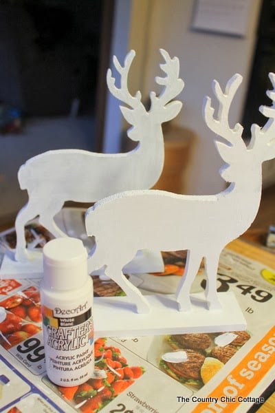 Glitter Dipped Deer Silhouettes -- perfect for your home in any season learn how to make this deer decor for your home. Click on the picture to head to the craft tutorial.