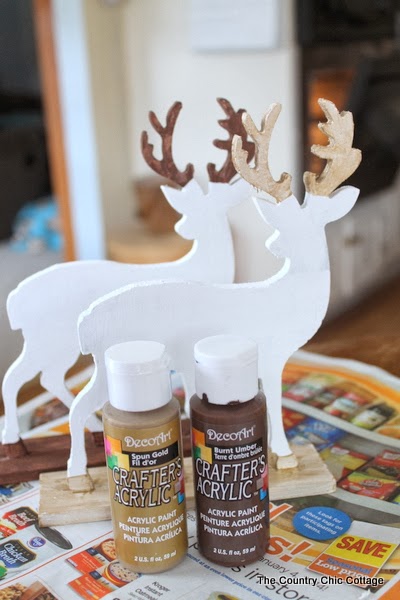 Glitter Dipped Deer Silhouettes -- perfect for your home in any season learn how to make this deer decor for your home. Click on the picture to head to the craft tutorial.