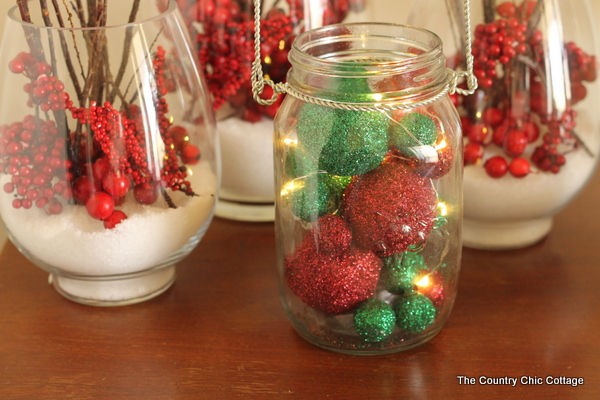 Glitter Mason Jar Christmas Luminary -- click the picture to get the full instructions on how to add this fun mason jar luminary to your Christmas decor.