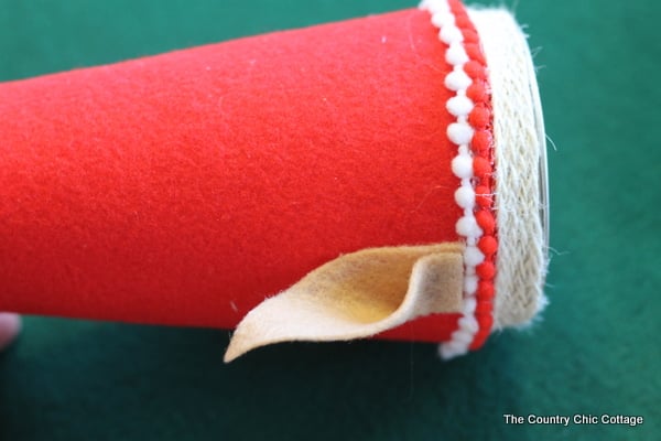 How to make an Elf Mason Jar Gift for Christmas -- learn how to make this fun craft for anyone on your gift giving list. attaching the ears