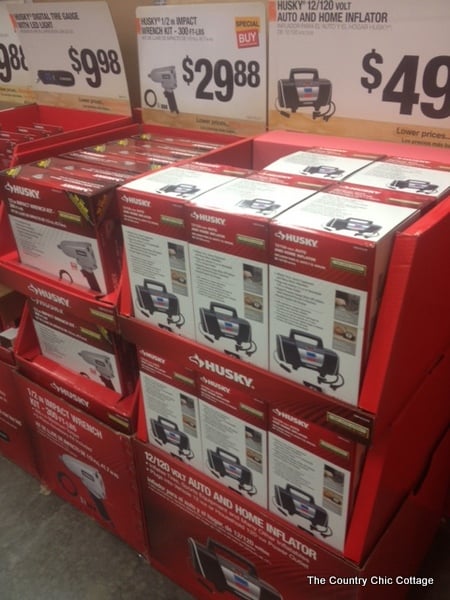 Gift wrap for men with duct tape -- a fun way to wrap gifts for guys! Learn how to make a bow from duct tape! gift area at front of Home Depot store