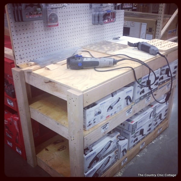 Gift wrap for men with duct tape -- a fun way to wrap gifts for guys! Learn how to make a bow from duct tape! dremmel on work bench at Home Depot