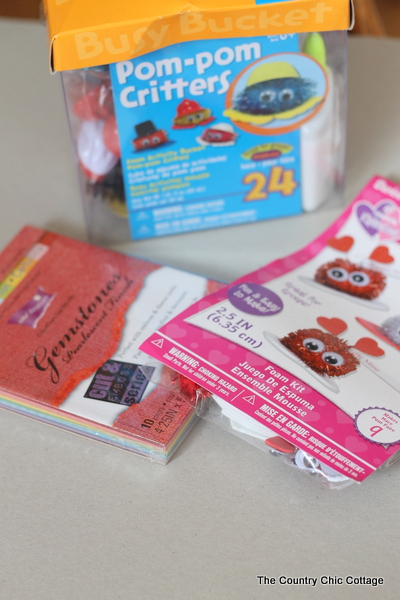 Supplies to make pom-pom critter valentine cards