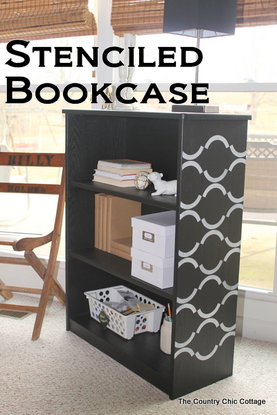 Stenciled bookcase -- a great idea for using new chalky finish paint to update an unfinished bookcase.