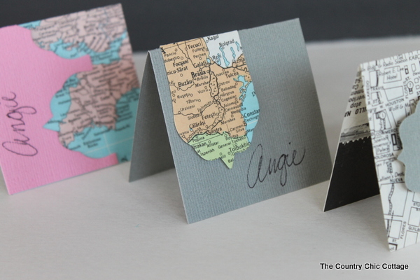 Recycled Map Placecards -- make placecards for your next party or a wedding from recycled maps with these great ideas. Folded name cards made from maps and cardstock.