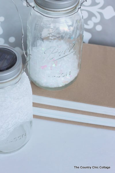 Solar Mason Jar Lights -- add tops to your mason jars and use solar power to light up the outdoors.