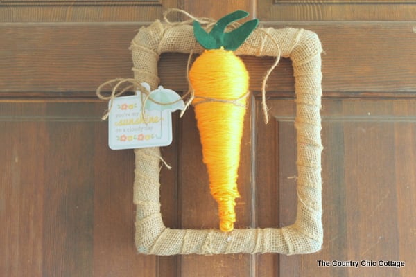 Carrot Spring Wreath -- grab some StyroFoam to make a fun carrot then add to a rectangular wreath. A fun spring wreath that is cute and unique.