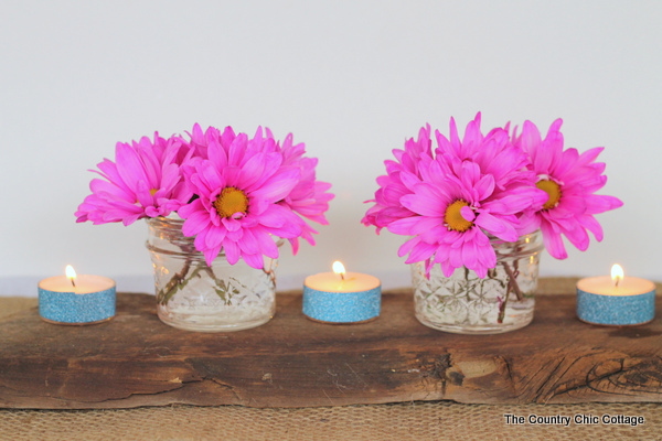 homemade glitter tea light decorations with jars of flowers