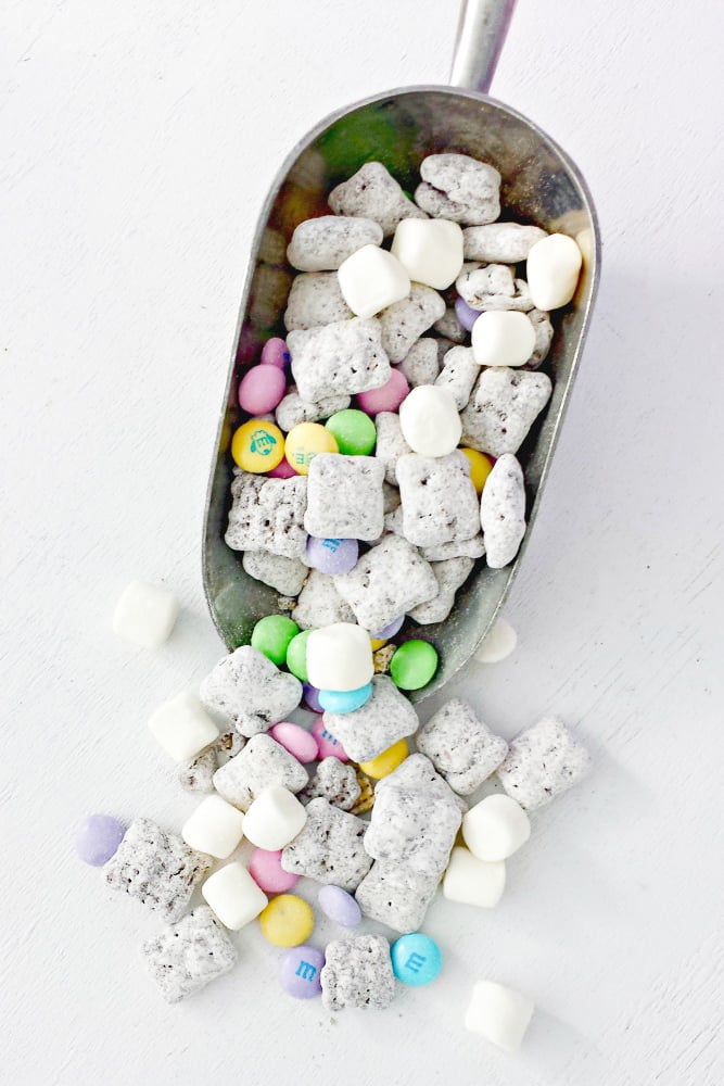 Top shot of easter muddy buddies in candy scoop.