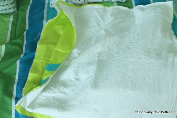 Showing how to sew a pillow cover