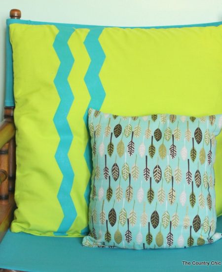 Chevron Stripe Pillow -- use special shaped tape to make chevron stripes on a fun pillow cover.