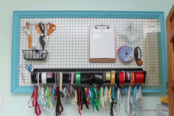 Organized Craft Room Tour -- a tour of a fabulous craft room with tons of ideas for organization. Plus a ton more craft room tours linked!