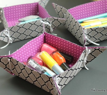 10 Minute Fabric Storage Tray -- a quick and easy way to make fun storage trays. Watch a video on how to make by clicking over to this post.