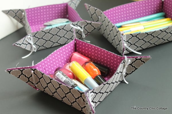 10 Minute Fabric Storage Tray -- a quick and easy way to make fun storage trays. Watch a video on how to make by clicking over to this post.