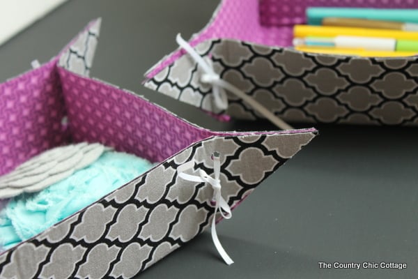 10 Minute Fabric Storage Tray -- a quick and easy way to make fun storage trays. Watch a video on how to make by clicking over to this post.