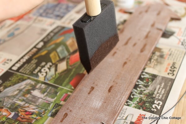 Brush with stain on wood