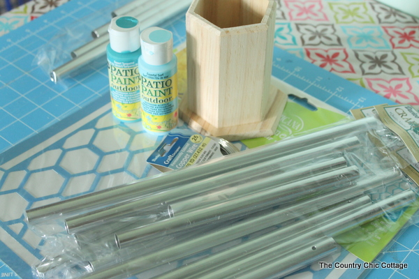 Make this:  Hexagon Wind Chimes -- a super simple way to make your own wind chimes this summer.  