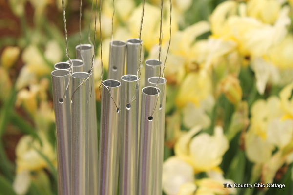 Make this:  Hexagon Wind Chimes -- a super simple way to make your own wind chimes this summer.  