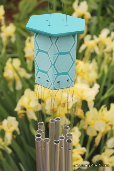 Make this:  Hexagon Wind Chimes -- a super simple way to make your own wind chimes this summer.  