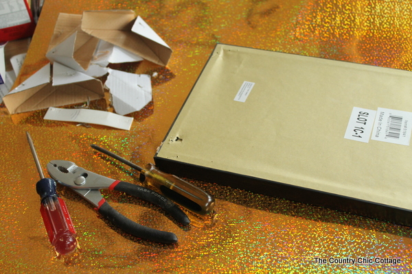 removing hardware from the back of a picture frame