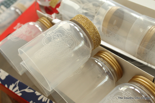 adding glitter tape to the lids of mason jar string lights