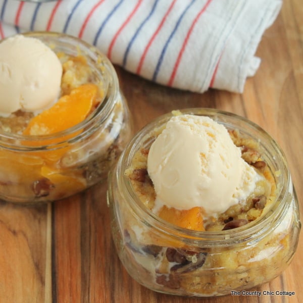 Dish up this simple peach dump cake in a cute mason jar and top with vanilla ice cream