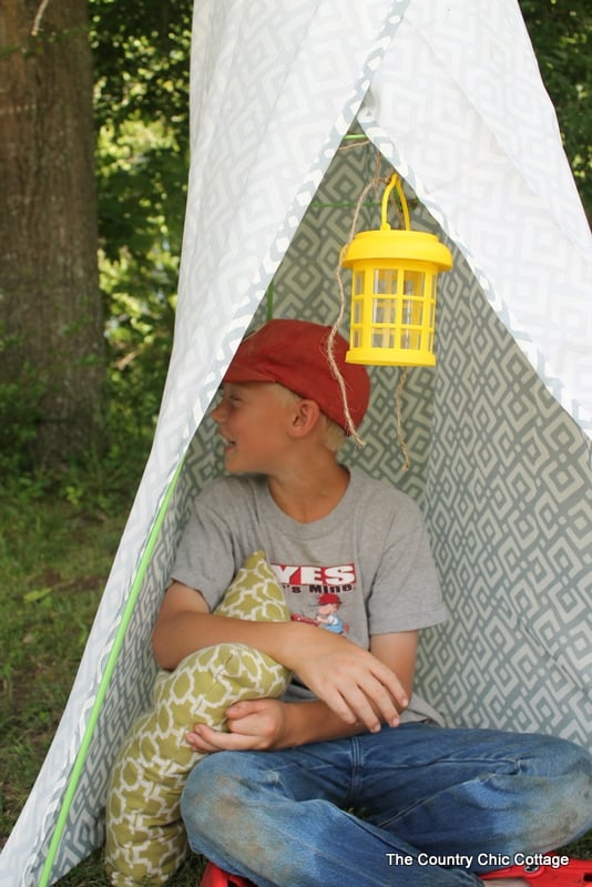 Backyard Teepee from Dollar General -- a fun way to spend an hour and build a teepee in your backyard. Let the summer fun roll with this project the kids can join in!