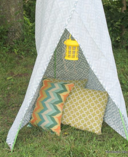 Backyard Teepee from Dollar General -- a fun way to spend an hour and build a teepee in your backyard. Let the summer fun roll with this project the kids can join in!