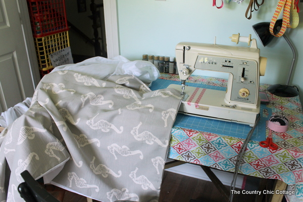 sewing the bottom hem of homemade curtains