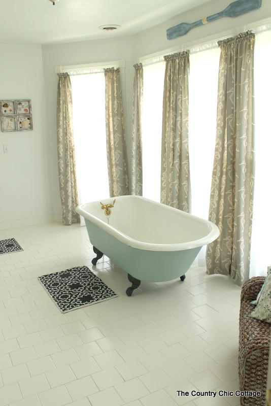 Nautical Themed Bathroom Design -- an elegant yet fun spin on the beach theme for a bathroom.