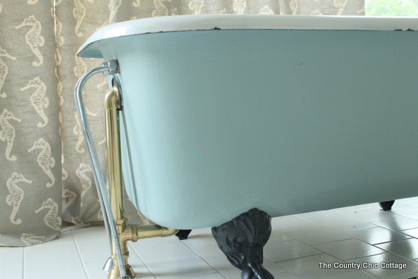 clawfoot tub painted in blue