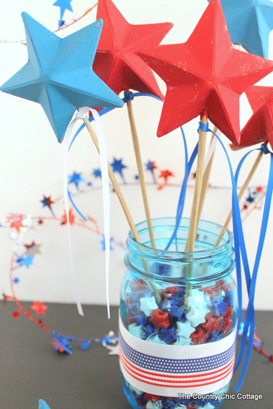 Patriotic Wand Centerpiece -- make a fun centerpiece with patriotic wands for your Fourth of July party. The kids can take home the wands at the end of the night.