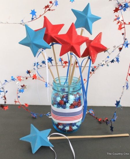 Patriotic Wand Centerpiece -- make a fun centerpiece with patriotic wands for your Fourth of July party. The kids can take home the wands at the end of the night.