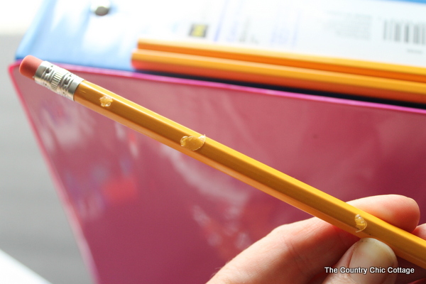 pencils in front of binder