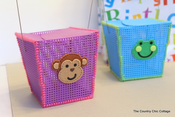 Plastic Canvas Storage Boxes -- a great craft for kids at summer camp or anytime of the year.  Helps to teach basic sewing skills as well.